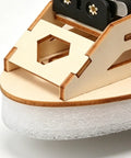 Close-up of Wooden Vehicle Model Kit For Hands On Mechanical Engineering Fans showing precision-cut wood components