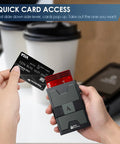 Hands holding Ultra Slim Card Holder For Men With Pop Up Wallet RFID Blocking Minimalist Wallet in dark green and black.