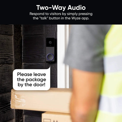 Wireless Duo Cam Video Doorbell With Chime Included, installed beside a door, showing delivery person and package