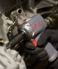 Mechanic using Half Inch Air Impact Wrench With Quiet Technology Up To 650 Foot Pounds Of Torque Ultra Compact And Light Weighs About Two Point Four Pounds Max Control for assembly