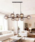 Black Glass Ball LED Pendant Light Transparent Globe Housing Decorative Hanging Fixture Chandelier Ceiling Light in stylish living room.