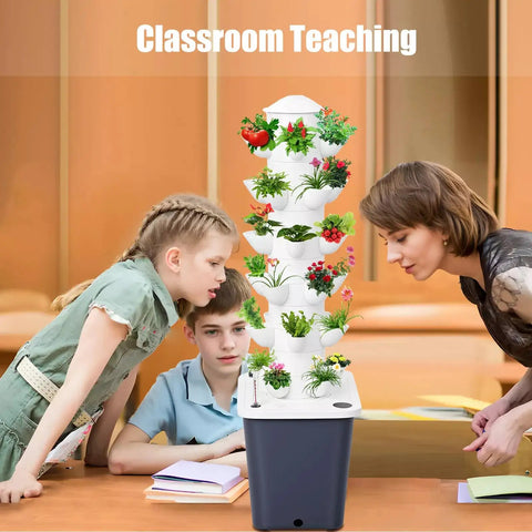 Classroom setting with students examining Vertical Hydroponic Tower Kit For Indoor Herb And Veggie Garden, 30 Plant Slots.