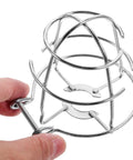 Six Pack Tool Free Fire Sprinkler Head Covers Tough As Nails Protector Cage with Exposed Shackle held in hand, silver metal, 3.14 by 7.08 inches.