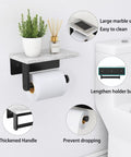 Marble Toilet Paper Holder With Shelf Wall Mounted 304 Stainless Steel Tissue Roll Holder Matte Black Bathroom Organizer Built To Last Easy Install No Fuss Modern Bathroom Setup, shown with a decorative plant and diffuser on the marble shelf.