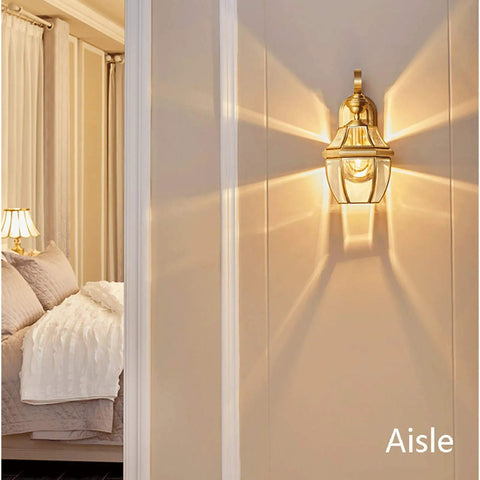 Retro Copper Wall Sconce Top Shelf All Metal Casting Dry Rated For Bedrooms Hallways And Porches warm light illuminating a hallway