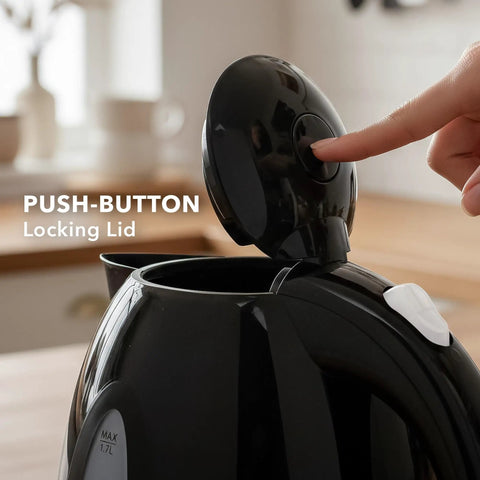Image of a black electric kettle with push-button locking lid, showing the open top. Electric Kettle 1.7 Liter Fast Boil Water Heater For Coffee Or Tea BPA Free With Water Level Gauge Auto Shut Off Boil Dry Protection Indicator Light Removable Filter Black.