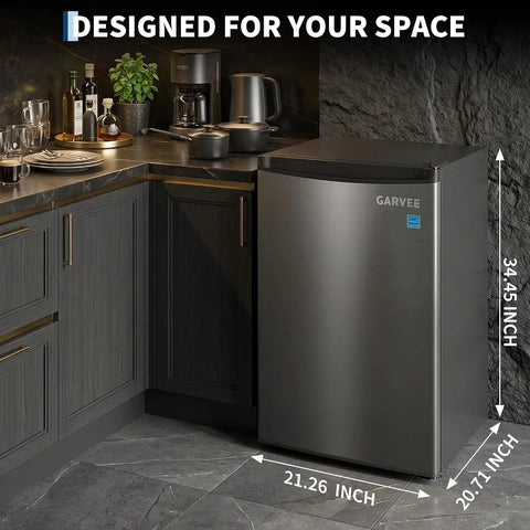 Dang Solid Upright Freezer 3.1 Cu Ft Single Door Vertical Deep Storage With Adjustable Shelves And Simple Mechanical Temp Control No Fuss Build For Garage Kitchen Or Basement In Slick Stainless Steel Finish in kitchen corner.