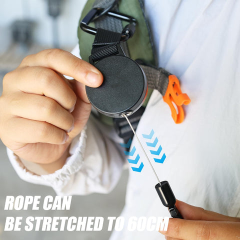 Person demonstrating Heavy Duty Retractable Keychain With Waist Hanging Design Expandable 60cm Wire Rope Anti-Theft