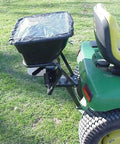 Tow Behind 12V Lawn Tractor Spreader For Grass Seed And Fertilizer With 80 Pound Capacity attached to tractor