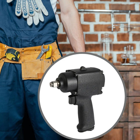 Compact Mini Pneumatic Impact Wrench Featuring Aluminum Alloy Chassis And Ergonomic Non Slip Handle in a workshop setting.