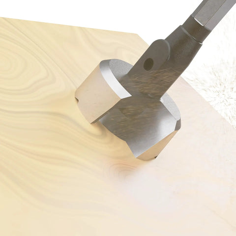Close-up of Pro Grade Self Feed Drill Bit With Single Cutter For Woodworking Two And One Eighth Inch drilling into wood surface