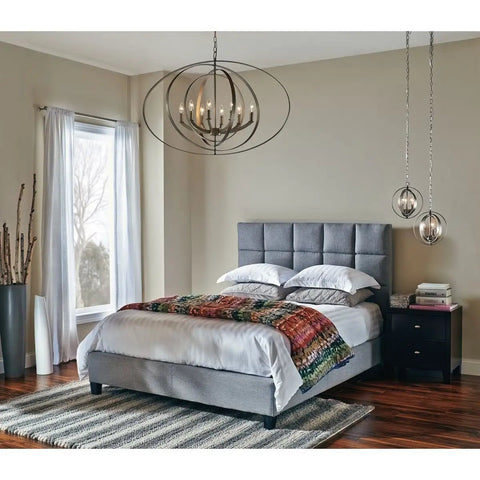 Bedroom with Astronomy Inspired Equinox Three-Light Sphere Pendant In Burnished Silver above the bed, coastal transitional style.
