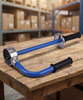 No Sweat Packing Heavy Duty Manual Stretch Film Dispenser Ergonomic Handheld Pallet Wrap Tool on a wooden table.