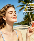 Woman on beach holding Beast Portable Handheld Fan On The Go With USB-C Rechargeable Battery, 100 Speed Adjustable