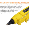 Close-up of yellow 300W Industrial Hot Glue Gun With Adjustable Switch focusing on nozzle and trigger mechanism.