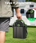 Person carrying Portable Misting Fan With Four Mist Sprayers Rechargeable 9 Inch Oscillating Camp Fan