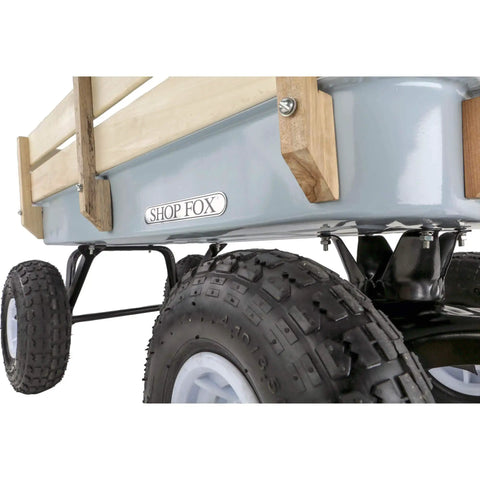 Close-up of wheel and frame of Beefy Heavy Duty Wagon With 14 By 32 Inch Steel Box, 10 Inch Pneumatic Wheels, High Wooden Sides