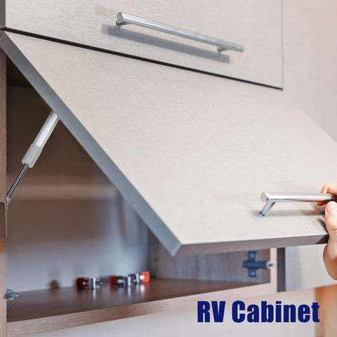 Heavy Duty Gas Struts 2 Pack 8 Inch 55 Lb Lift Supports Silver Tone in RV cabinet lid propped open