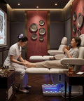 Professional Fully Electric Facial Massage Table With Lift For Estheticians, dual control used for a relaxing foot treatment in a spa setting.