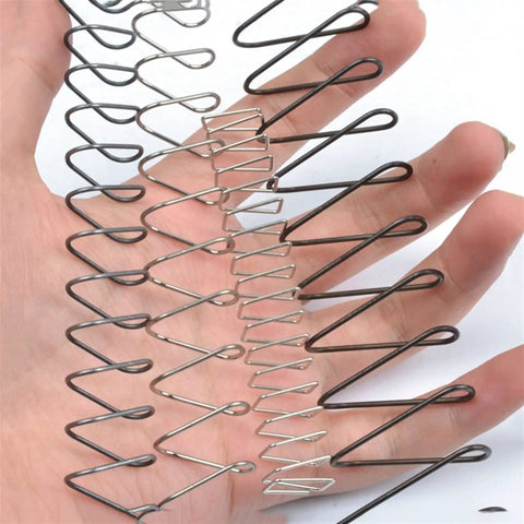 Extension Compression Springs Kit With Pro Grade Spring Steel Rectangular Wire Springs displayed on hand