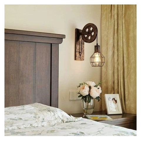 Vintage Black Rust Metal Sconces E27 Socket with pulley design mounted beside bed in cozy room setting.