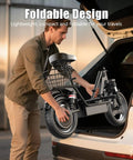 Man placing Electric Scooter With Seat For Adults 1000 To 1400 Watt Peak Motor Delivers Up To 25 MPH And A 30 To 45 Mile Range 14 Inch Foldable Escooter into car trunk