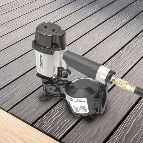 Pro Grade Coil Roofing Nailer Fires 1-3/4 Inch 15 Degree Fasteners with aluminum body on wood deck.