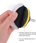 Hand holding 3-inch wool buffing pad with adhesive backer pad and M10 drill adapter from 7 Pcs Pro Grade Wool Buffing Pads For Car Polisher.