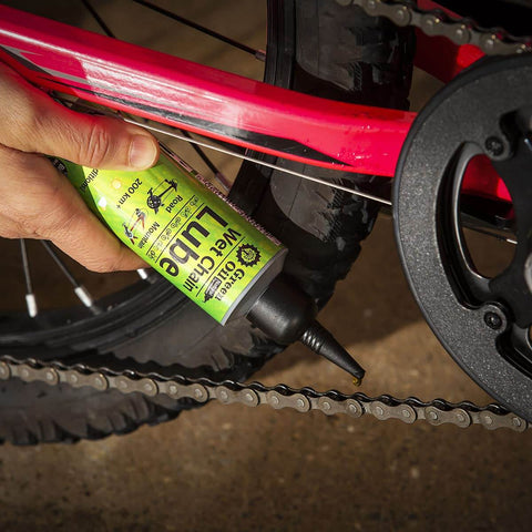 Applying Saver Bundle Wet Bike Chain Lube And Bike Cleaner Set Natural Eco Friendly Palm Oil Free Made In UK on bicycle chain