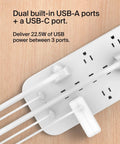 12 Outlet Surge Protector Power Strip With 12 AC Outlets, 2 USB A Ports And 1 USB C Port, white design on wooden surface