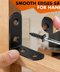 Close-up of 18 Pack Black L Bracket Corner Braces Set With 72 Screws Durable 90 Degree Metal Right Angle Brackets on wood