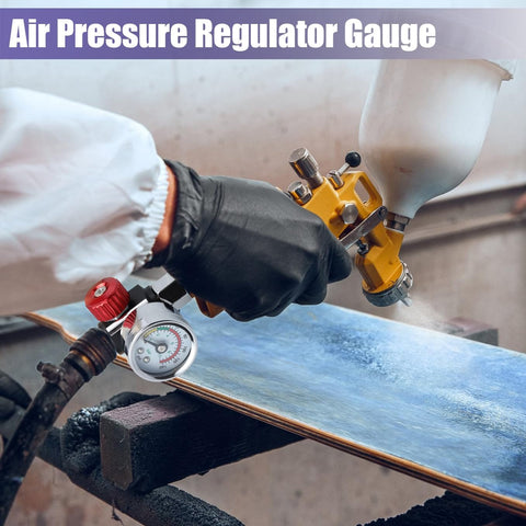 Person using One Quarter Inch Air Regulator With Gauge 0-140 Psi for Spray Guns and Paint Sprayers on a wooden surface