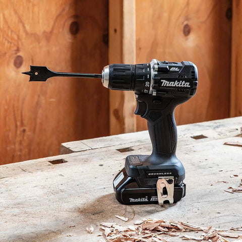 Sub Compact Brushless Cordless Drill Driver Kit With Metal Chuck And Two Speed Gears Built For Tough Jobs And Tight Squeezes Hella Smooth Ride For Tradesmen on a workbench.