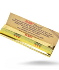 Ethereal King Size Rolling Papers 5 Pack 32 Leaves Per Pack 160 Leaves Ultra Thin For A Near Weightless Feel Perfect For Skilled Rollers And Smoother Puffs, gold colored open pack showing thin papers.