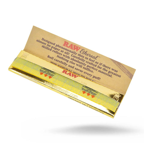 Ethereal King Size Rolling Papers 5 Pack 32 Leaves Per Pack 160 Leaves Ultra Thin For A Near Weightless Feel Perfect For Skilled Rollers And Smoother Puffs, gold colored open pack showing thin papers.