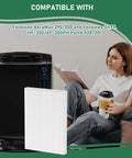 AeraMax 300 True HEPA Replacement Filter 3 Pack with Fellowes purifier next to woman on sofa, reading and drinking coffee.