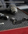 Ultimate Motorcycle Chain Tensioner Adjuster Roller Kit For Atv Dirt Bike 110-300Cc With Rock Solid Plastic And Iron Build To Stop Chain Slippage And Keep Your Ride Smooth On Any Trail. Black roller adjuster shown on a workbench.