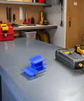 4 Piece Auto Dent Repair Kit With Plastic And Metal Puller Tabs For Damage Free Paint Safe Body Repair on workbench