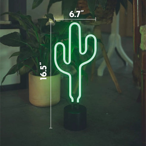 Green Neon Cactus Desk Light That Is Lit For Any Room, 16.5 inches tall, on a black round base, illuminating a room corner.
