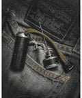Rip Spool Field Repair Kit Orange For On The Go Fixes Your Must Have Outdoor Gear Upgrade placed on denim jeans pocket