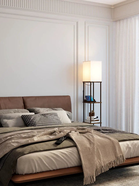 Bedroom with Shelf Floor Lamp With 2 USB Ports And Power Outlet, Remote Control LED Bulb, Brown Finish beside a bed.