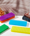 Polypropylene Microcentrifuge Tube Rack Set in multicolor display for lab use, featuring five-color assorted stands on table