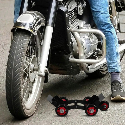 Amosfun Motorcycle Tire Dolly Tool With Five Smooth Wheels Heavy Duty Vehicle Mover For Electric Bikes Scooters And Tricycles Effortless Transport Roller For Garage Emergency Flat Tire Repair And Maintenance positioned near a motorcycle tire.