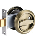 Slick Brushed Bronze Recessed Pull Handles for Sliding Doors and Cabinet Drawers Rock Solid Hidden Cup Knobs with Quick Install Screws Heavy Duty Furniture Hardware Killer Finish close-up view of round brushed bronze lock hardware.