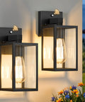 Two Pack Dusk To Dawn Outdoor Wall Lanterns With Automatic Sensor For Front Porch And Garage Waterproof Black Exterior Lights mounted on wall.