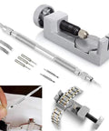 Adjustable Watch Link Removal Kit with six interchangeable tips and extra pins, pin pusher, and spring bar tool for bracelet repair.