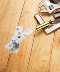 Heavy Duty Pivot Door Hinges Set, Stainless Steel Concealed Pivot Hinge For 20-40mm Doors, 2 Pairs, on wooden surface with tools
