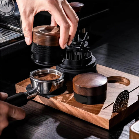 Top Shelf Wood Tamper For Espresso Makers Featuring Spring Loaded Calibration For 51mm 54mm And 58mm Portafilters in use on a wooden barista station.
