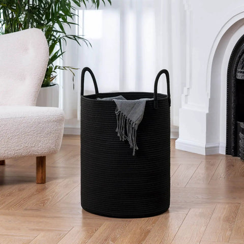 Tall Black Woven Rope Laundry Basket in living room, modern hamper for clothes, blankets, toys, 15 x 20 inch bin with handles