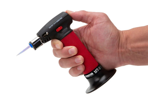 Hand holding Go To Professional Butane Torch Lighter Handheld Mini Blow Torch With Adjustable Flame Refillable For Soldering MT 51